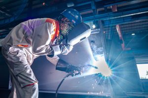 A welder working in a factory
